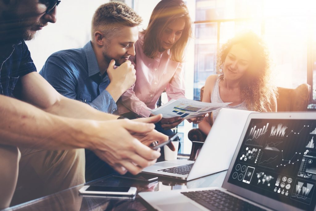 A Team of Brainstorming Digital Marketing Specialists
