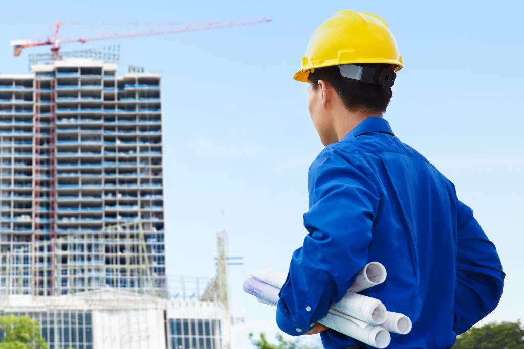 An engineer heading to a building