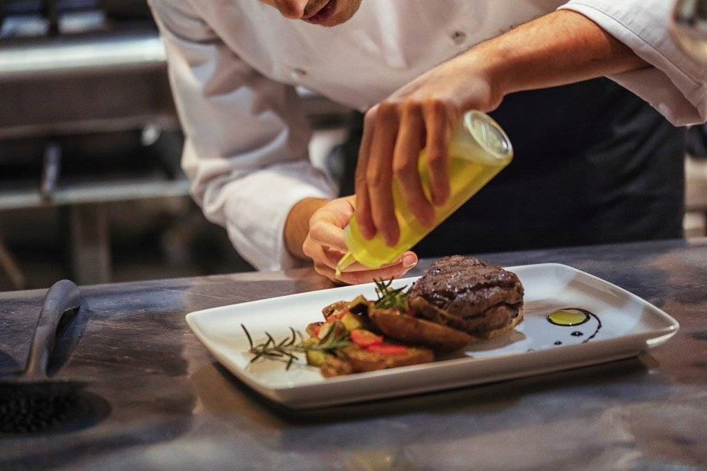 Chef working on food presentation