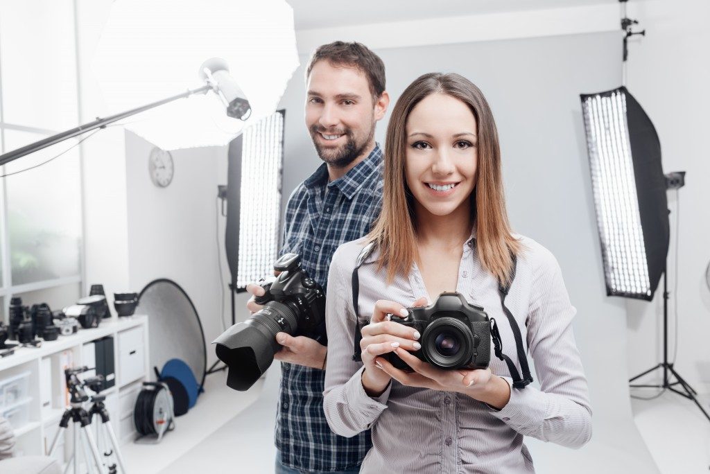 Professional photographers in studio