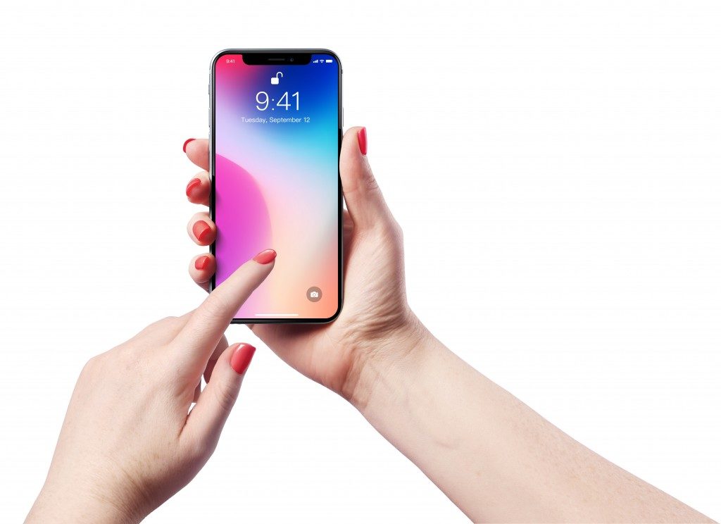 Woman unlocking the iphone