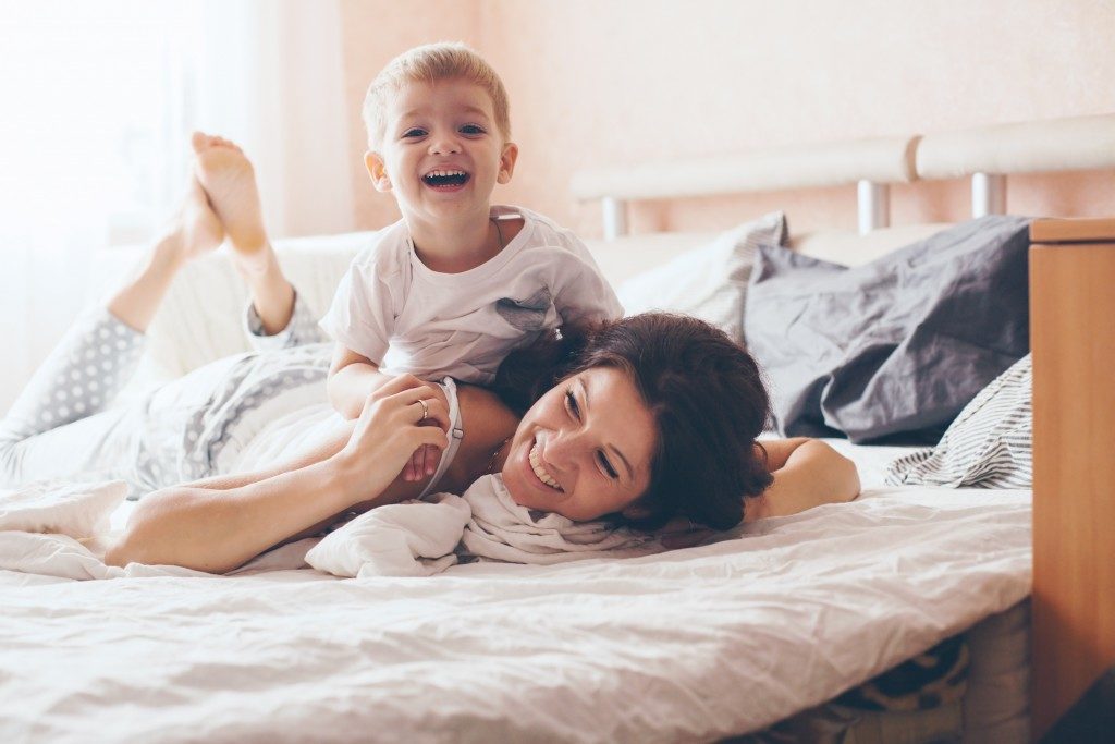 mother and child playing in the morning