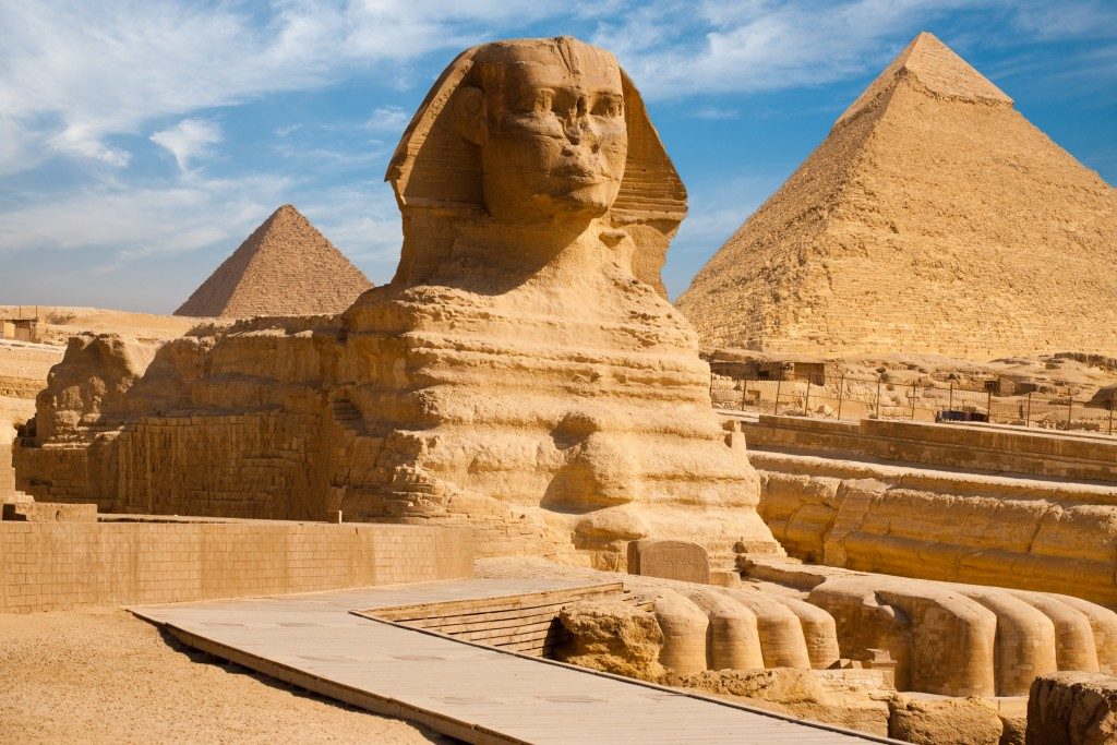 Beautiful profile of the Great Sphinx including pyramids of Menkaure and Khafre