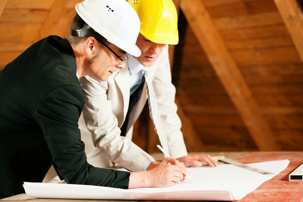 engineer and architect working on site