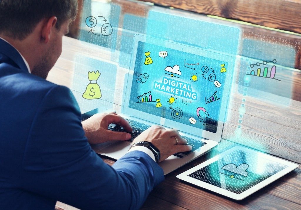 digital marketing icons flashing on gadgets screen