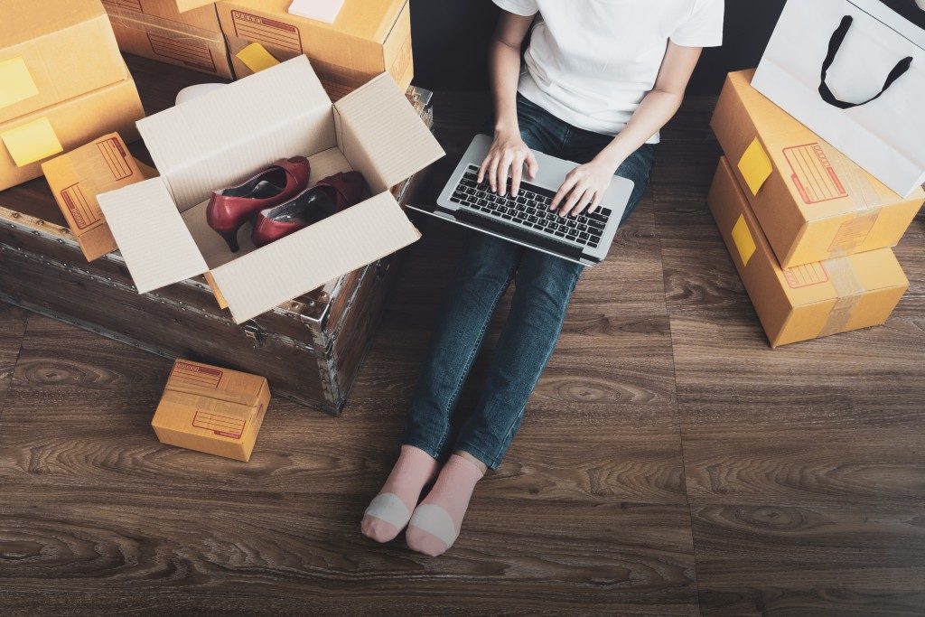 entrepreneur monitoring online orders